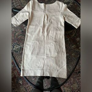 Lacoste dress, cream or in colour.